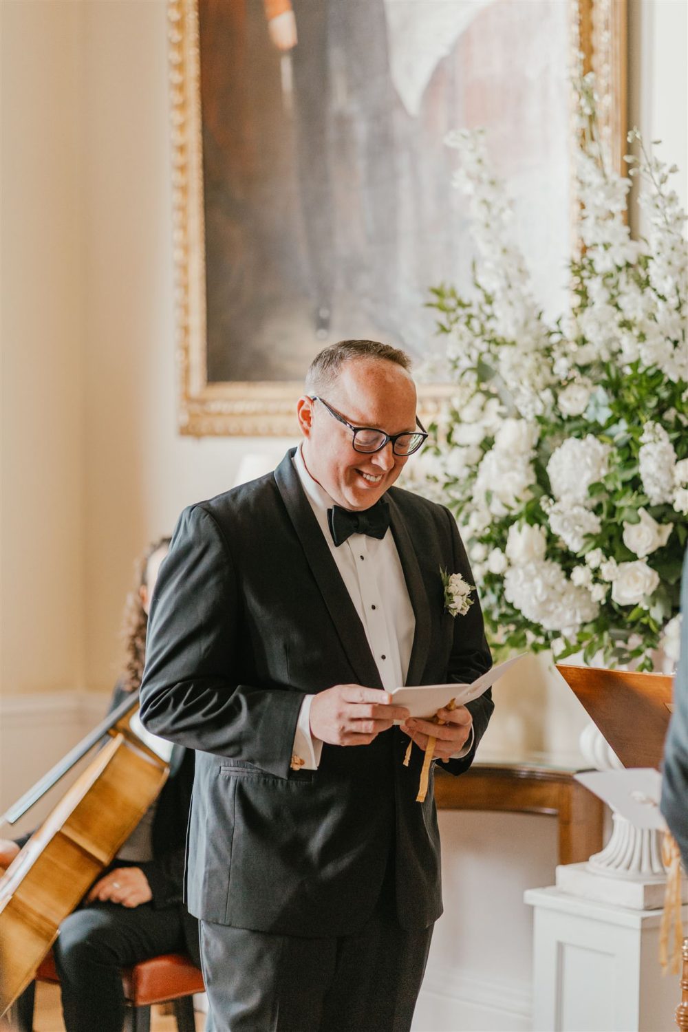 groom reading vows during trinity house wedding ceremony in the court room