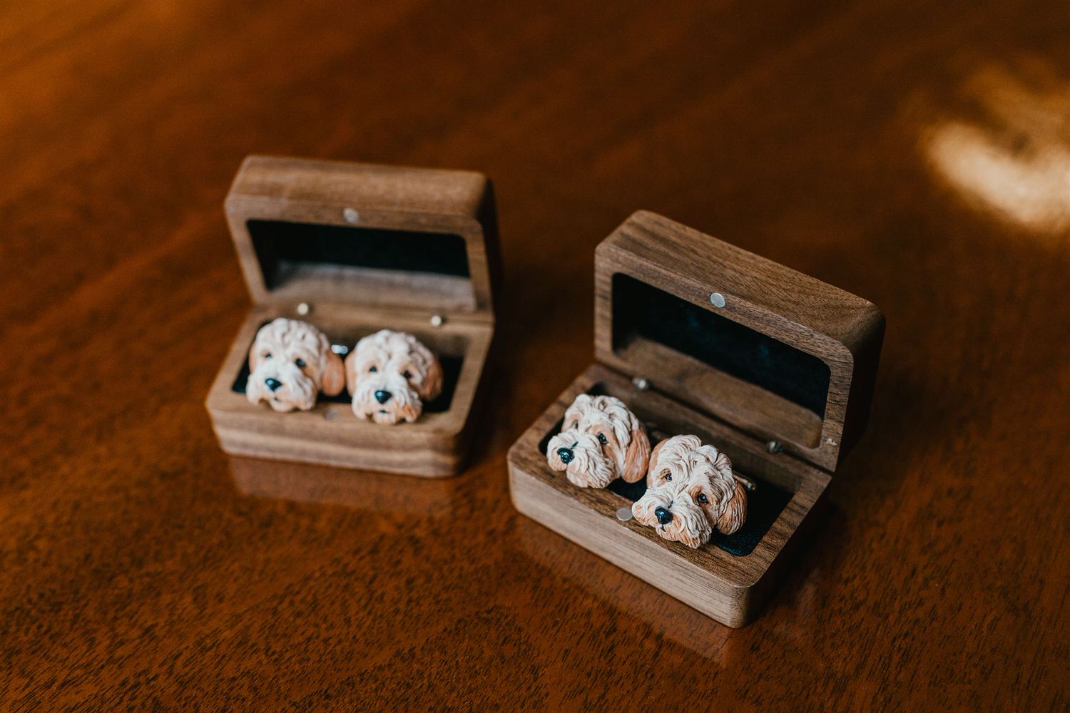 dog cufflinks in wooden boxes