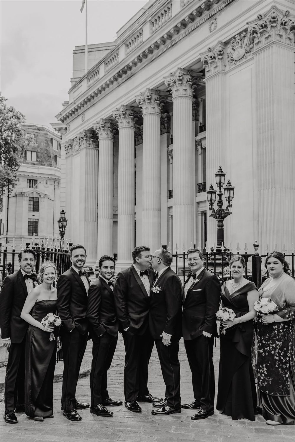 black and white wedding party portrait outside trinity house london wedding