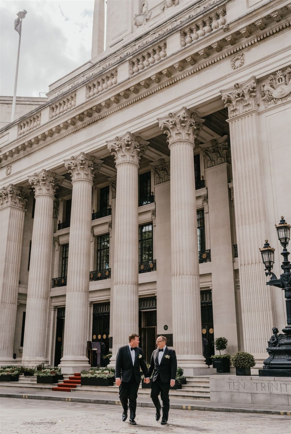 grooms couple portraits outside the four seasons at trinity house wedding