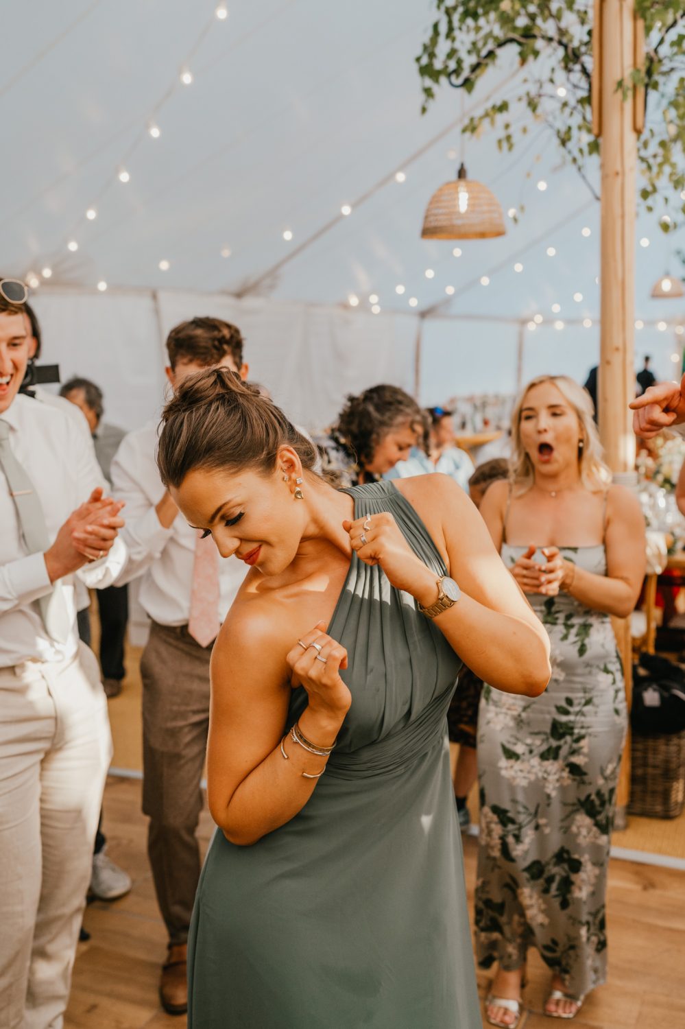 wedding guests on the dancefloor in the marquee at English Oak Vineyard wedding in Poole