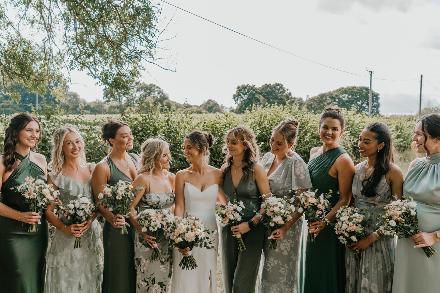 bride and bridesmaids at English Oak Vineyard wedding in dorset