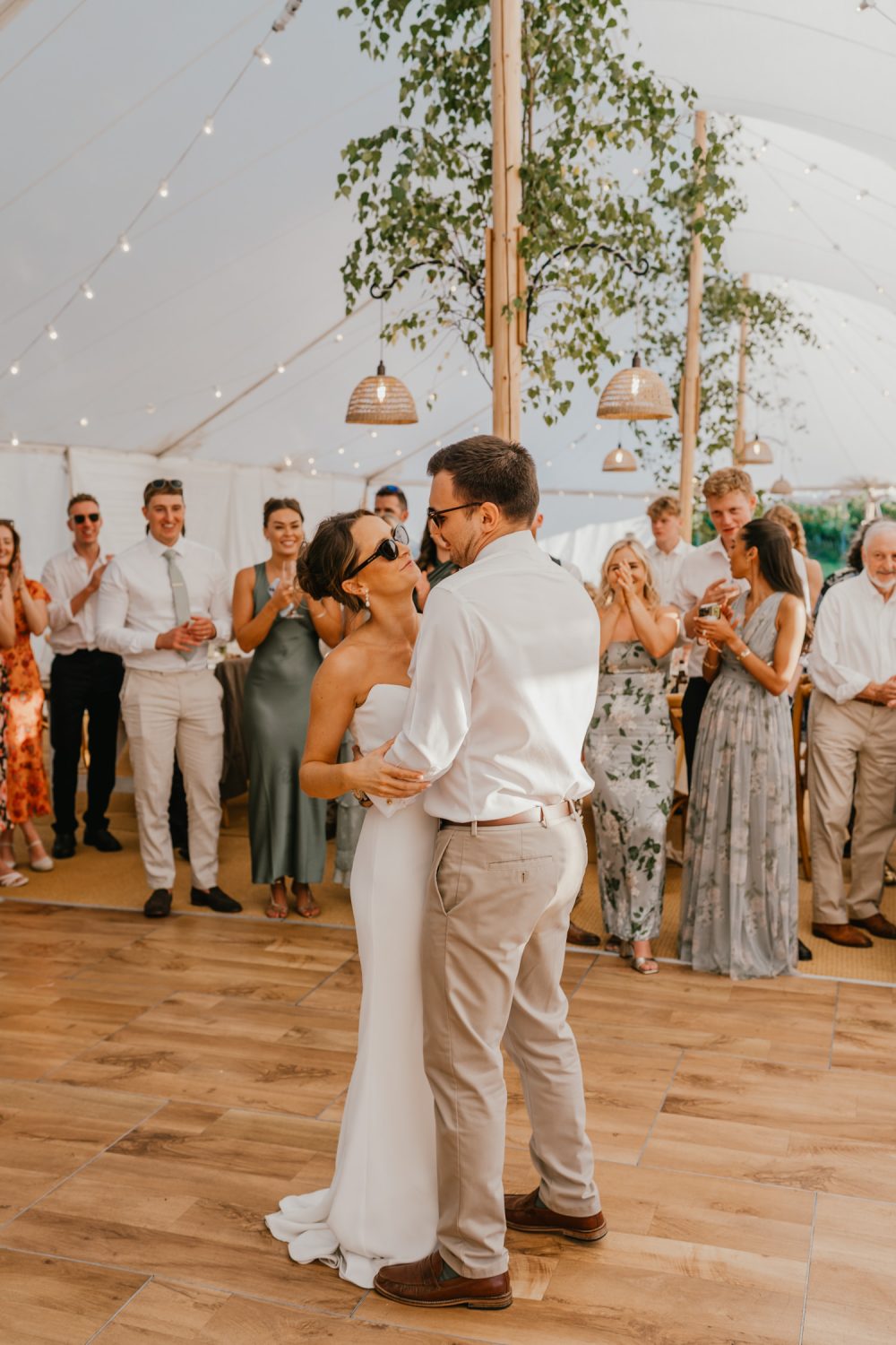 bride and groom first dance in the marquee at English Oak Vineyard wedding in Poole