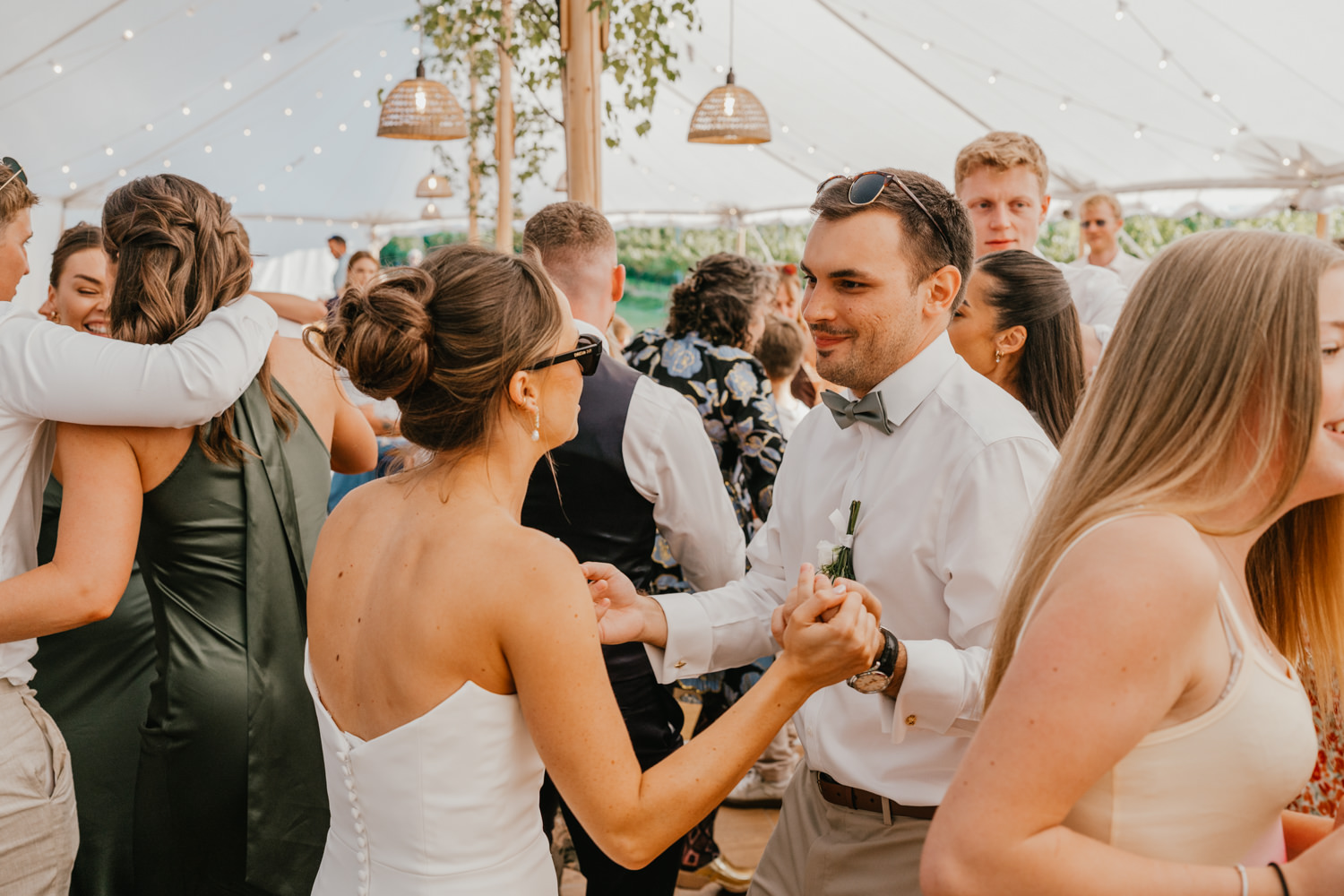 bride and groom on the dancefloor in the marquee at English Oak Vineyard wedding in Poole