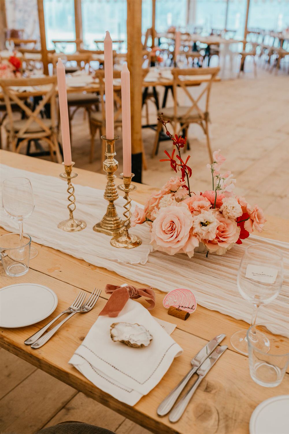 wedding decor with oyster shells and pink florals at the beacon tunbridge wells wedding