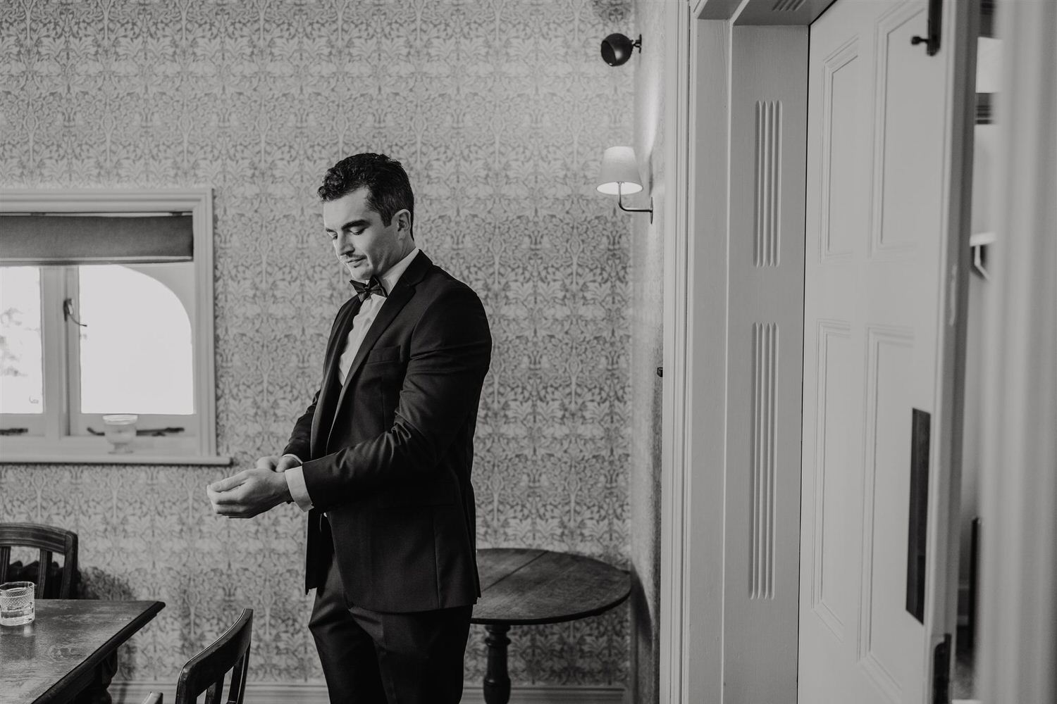 black and white photo from groom prep at the beacon tunbridge wells wedding