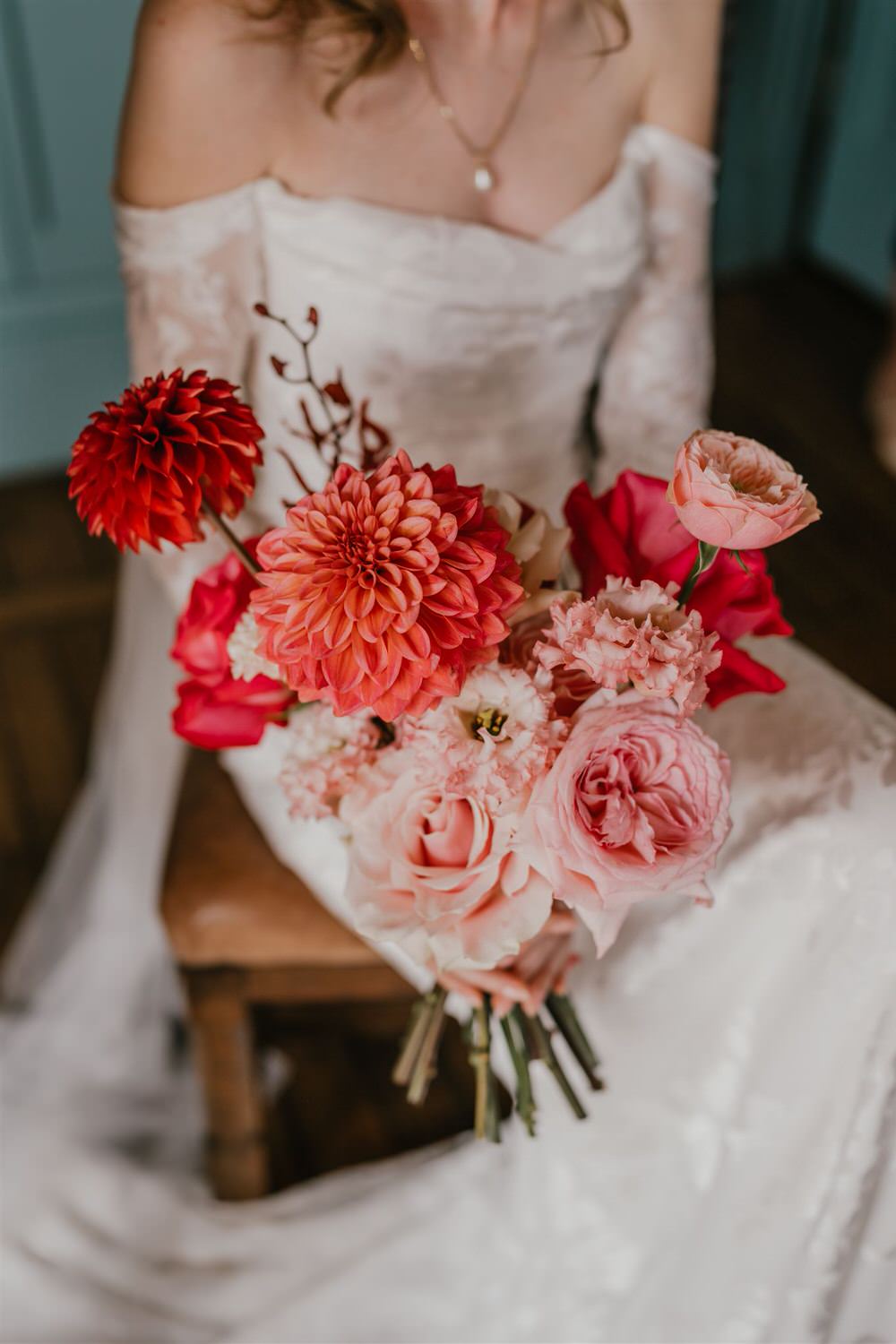 bride holds pink bouquet at the beacon tunbridge wells wedding