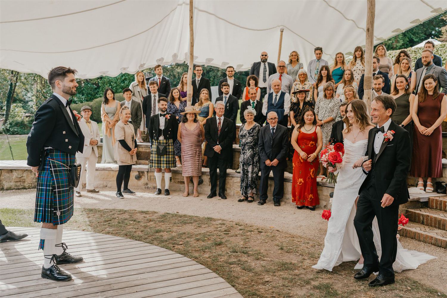 outdoor wedding ceremony at the beacon tunbridge wells wedding venue in kent