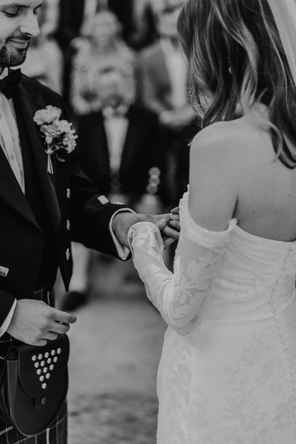 black and white photo of ring exchange at the beacon tunbridge wells wedding ceremony