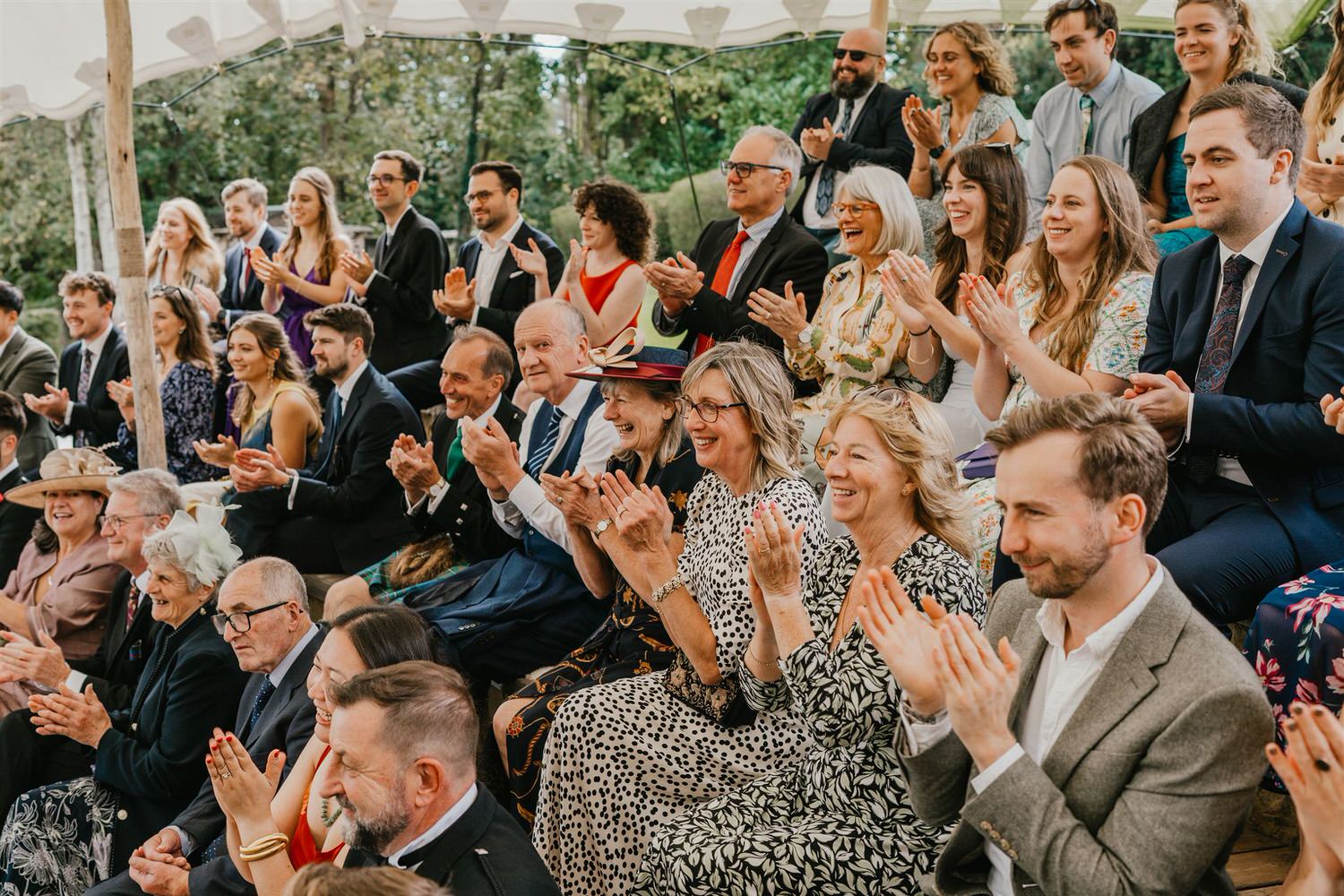 guests applaud at the beacon tunbridge wells outdoor wedding ceremony