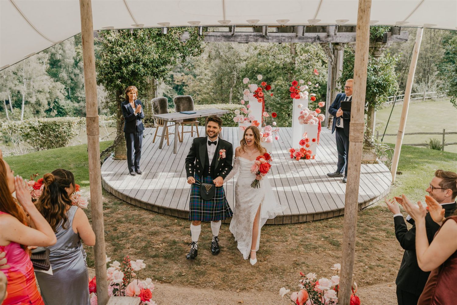 bride and groom walk back up the aisle at the beacon tunbridge wells wedding ceremony