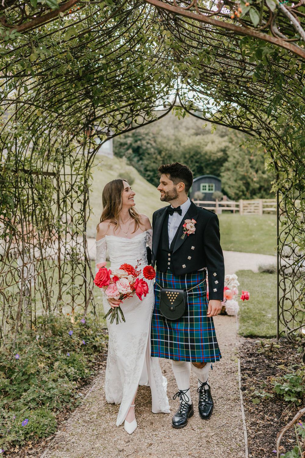 bride and groom couple portraits in the gardens at the beacon tunbridge wells wedding venue in kent