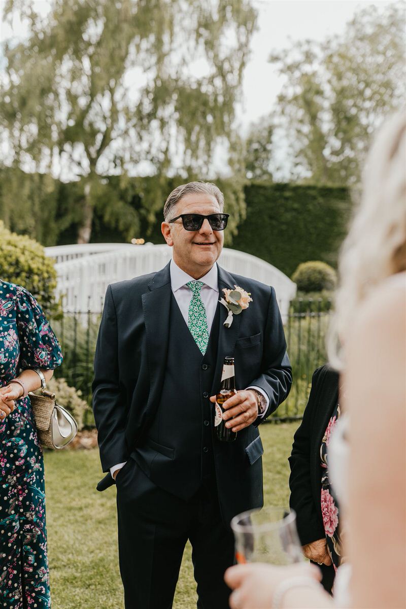wedding guests during drinks reception at winters barns wedding