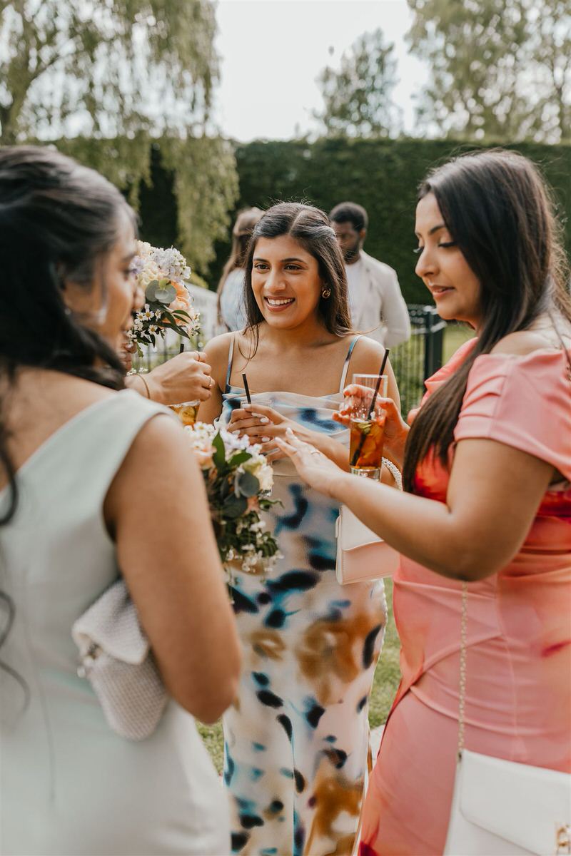 wedding guests during drinks reception at winters barns wedding