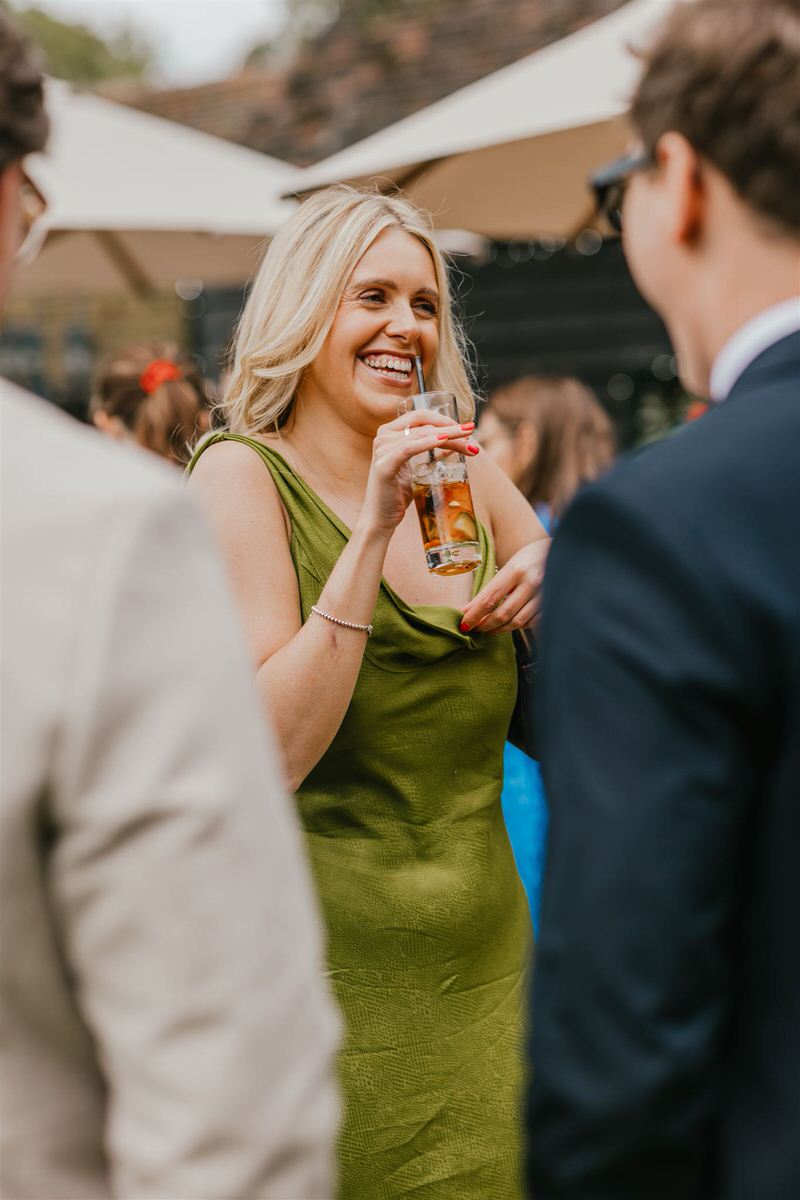 wedding guests during drinks reception at winters barns wedding