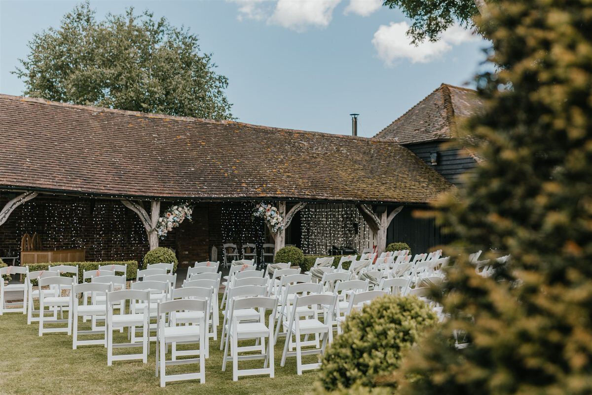 outdoor ceremony setup at winters barns wedding in canterbury