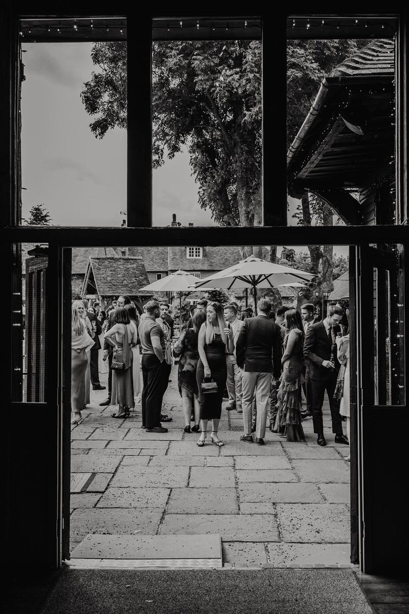 wedding guests during drinks reception at winters barns wedding