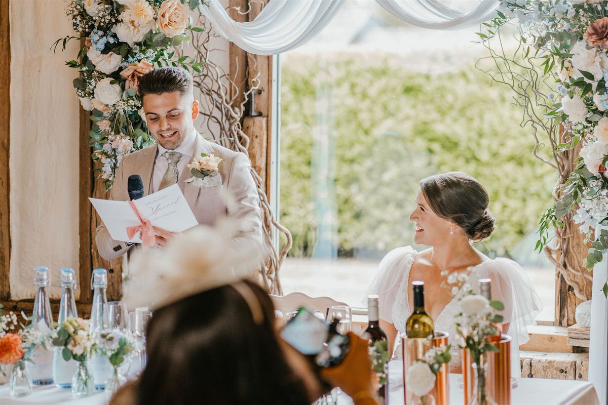 groom gives speech at winters barns wedding