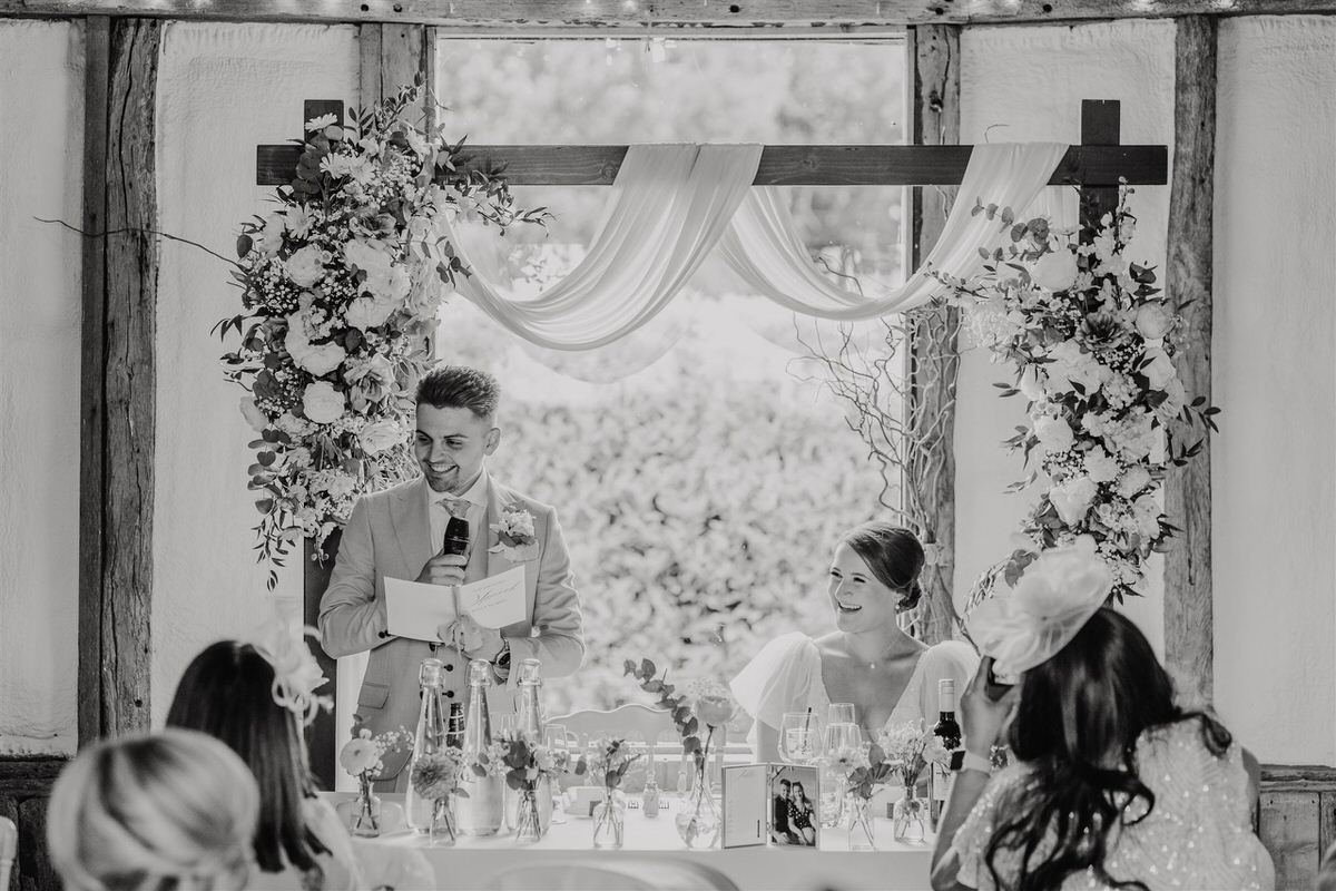 groom gives speech at winters barns wedding