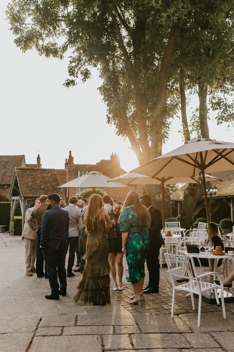 wedding guests during golden hour at winters barns wedding reception