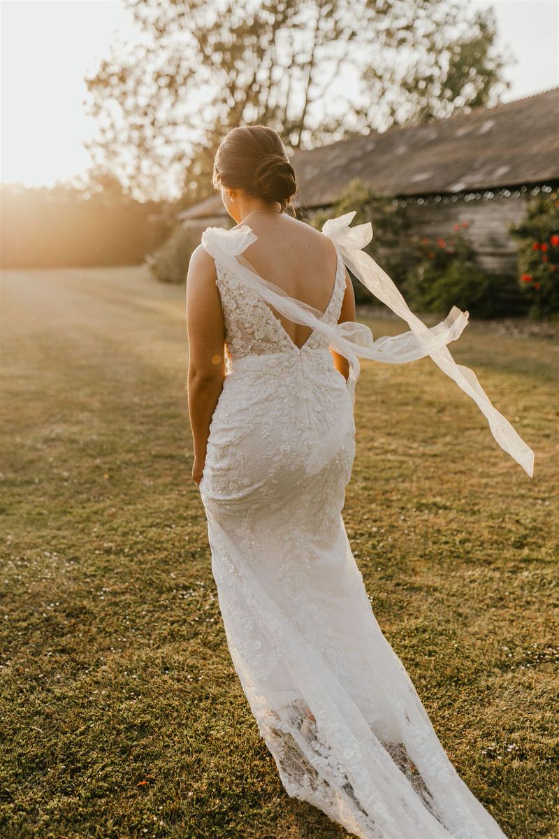 bride during golden hour at winters barns wedding