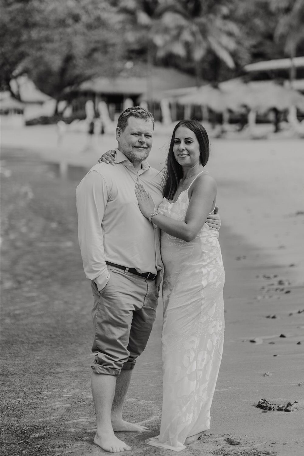 black and white image of couple embracing on sugar beach in saint lucia destination photography
