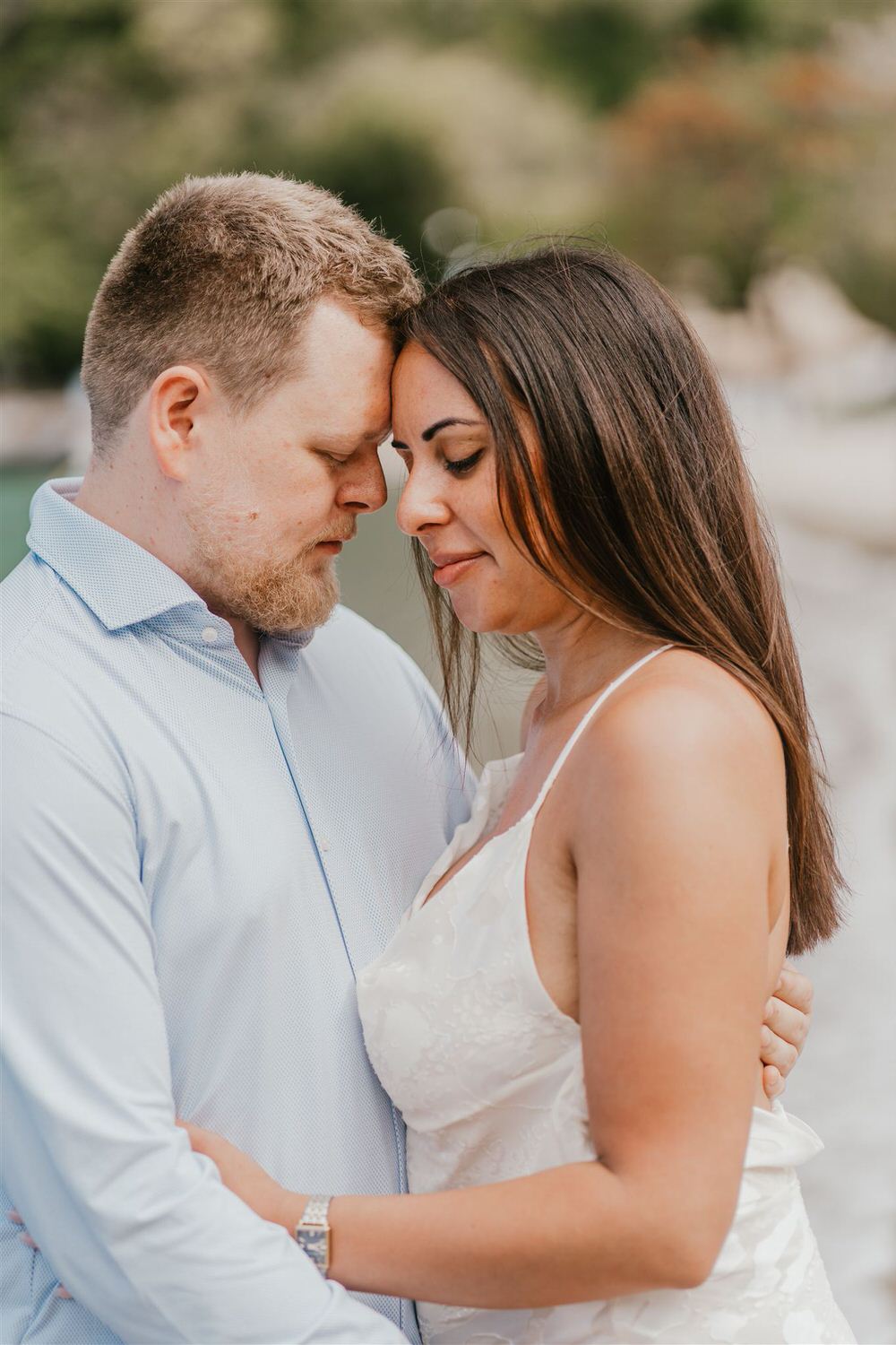 couple embracing on sugar beach in saint lucia destination photography