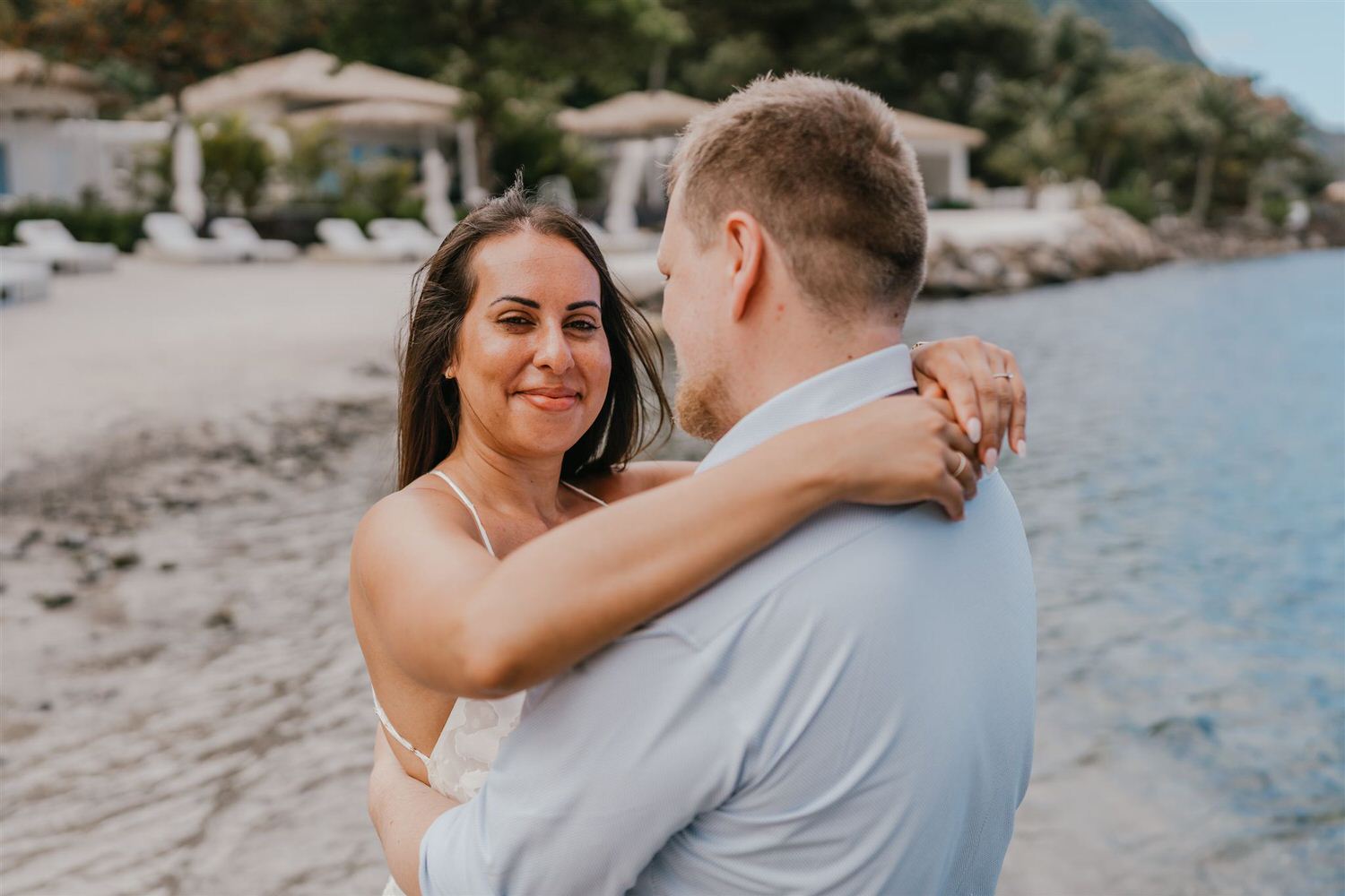 couple embracing on sugar beach in saint lucia destination photography