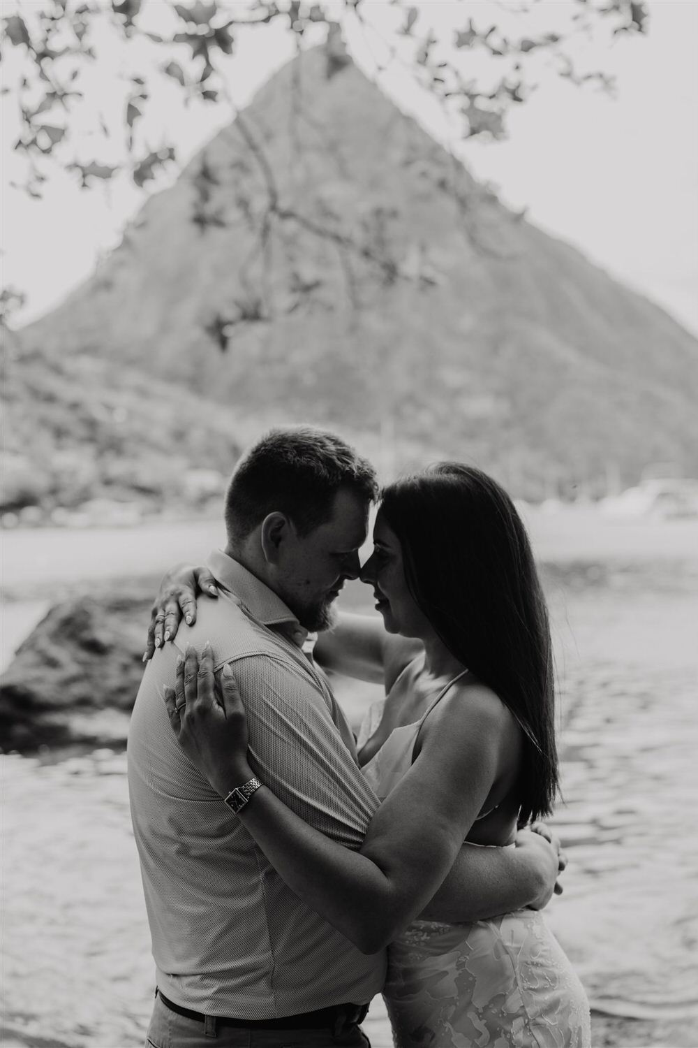 black and white image of couple embracing on sugar beach in saint lucia destination photography