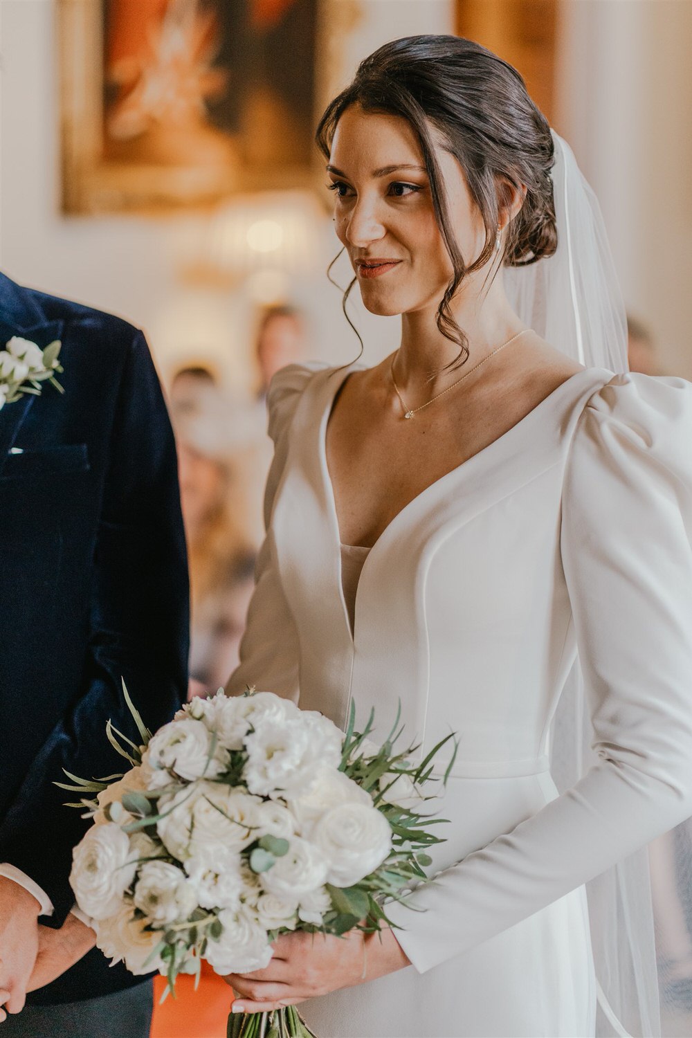 bride says vows during winter wedding ceremony at trinity house in london