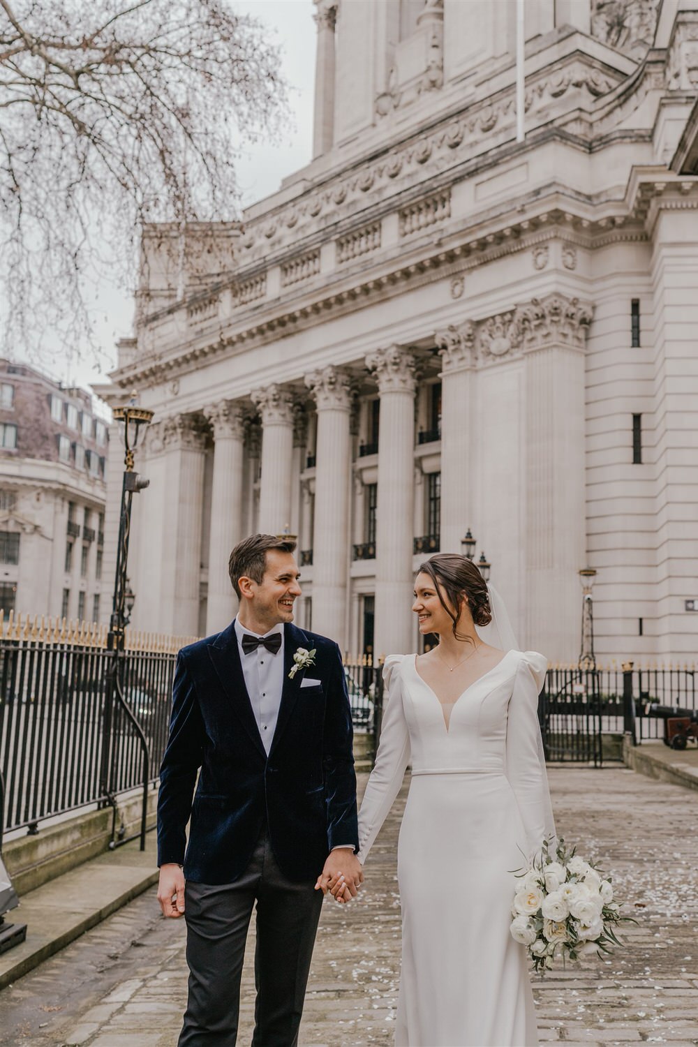 bride and groom couple portraits outside trinity house in london