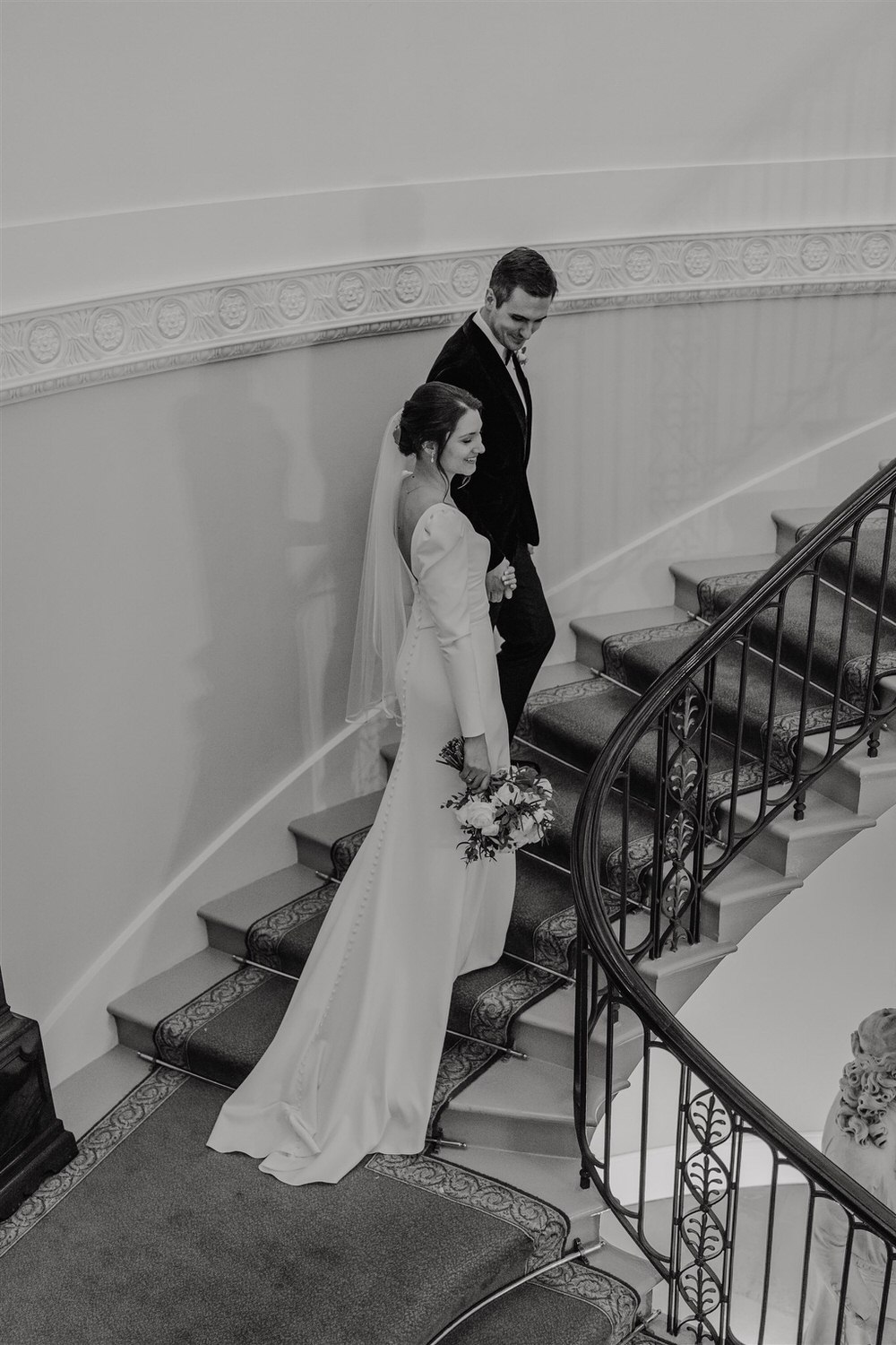 black and white bride and groom couple portraits inside trinity house in london winter wedding