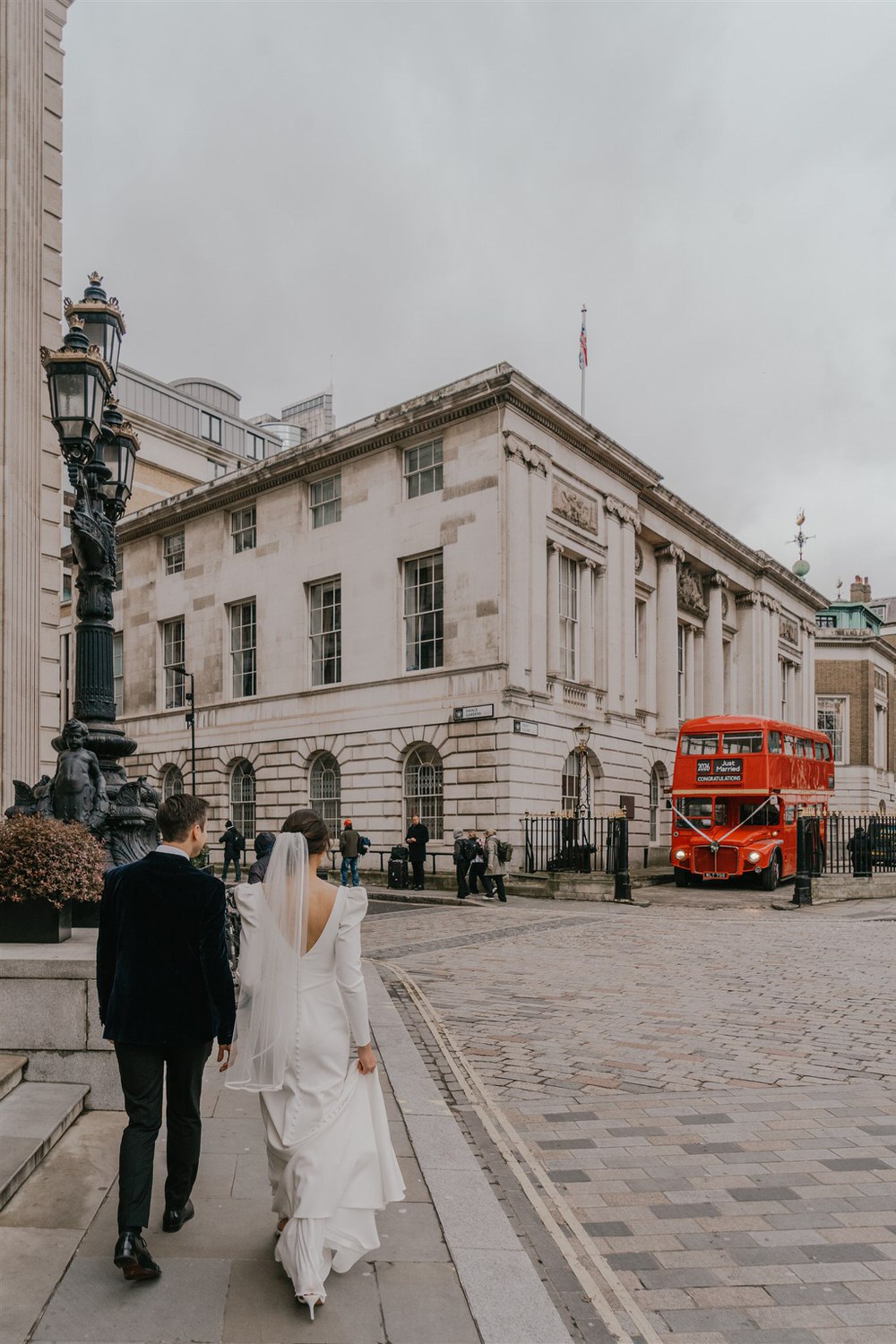 bride and groom couple portraits outside trinity house at winter wedding in london