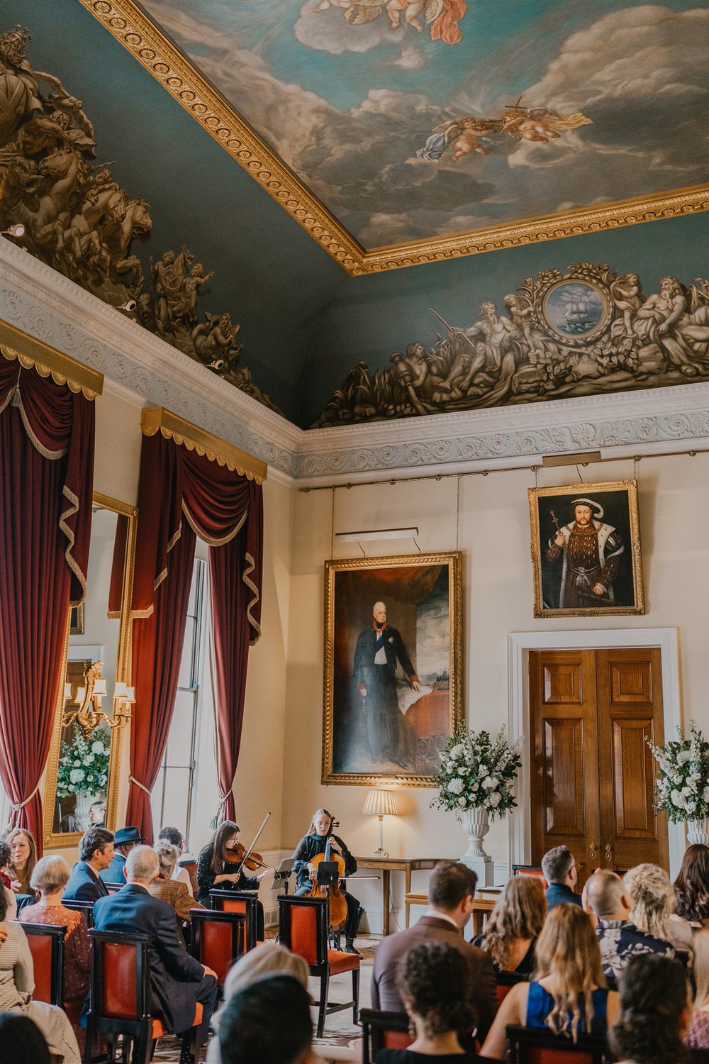 string musicians playing ceremony music at trinity house in london wedding